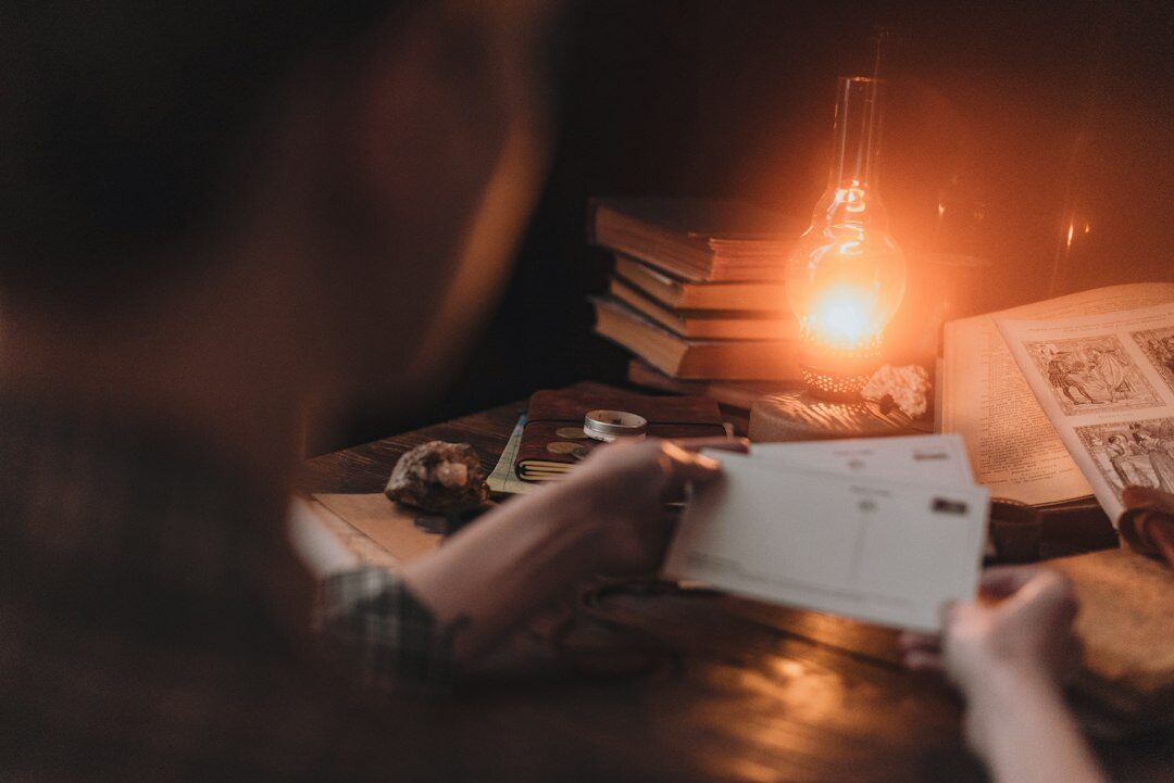 writer at desk with thriller notes