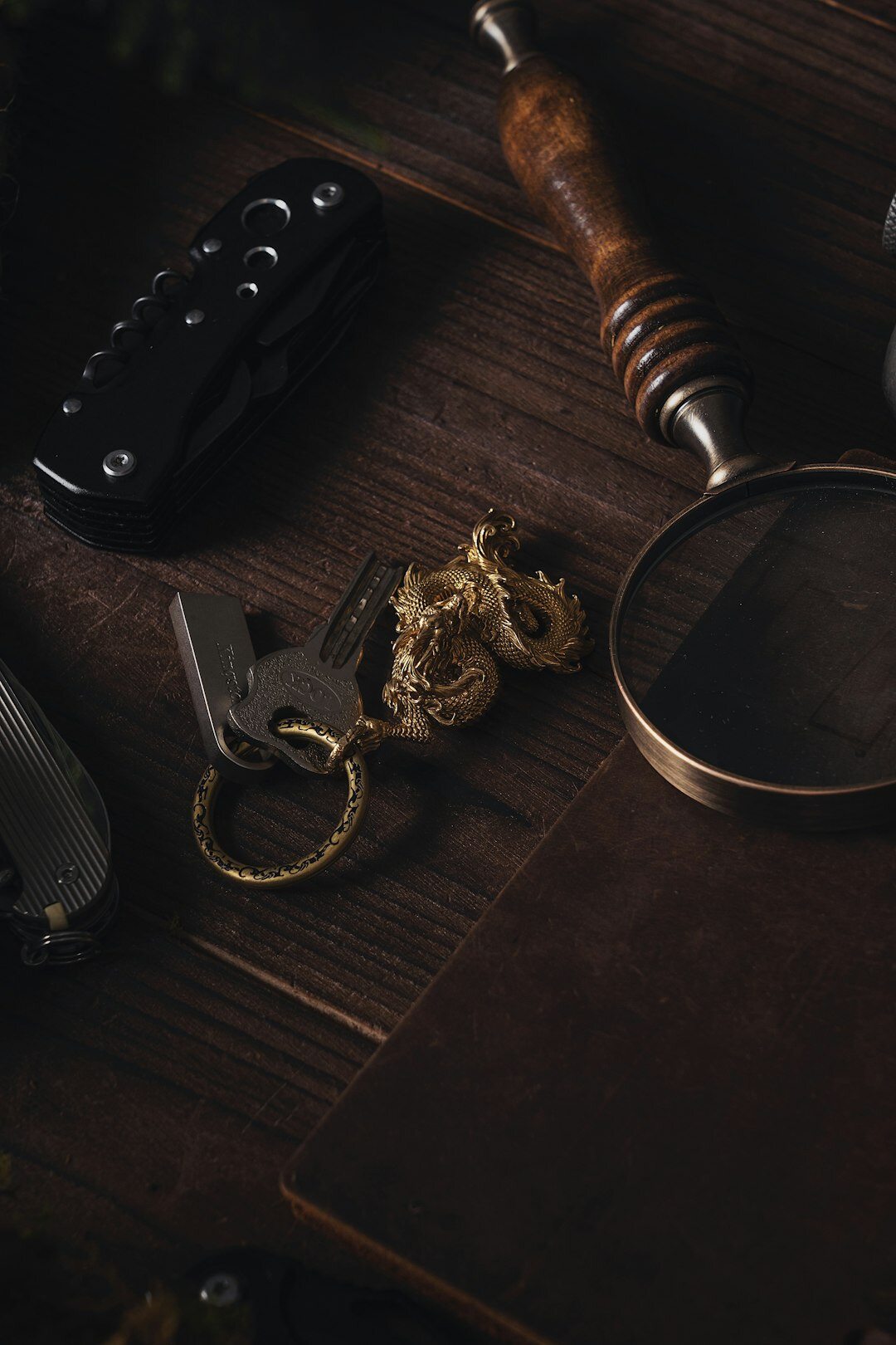 open mystery book with magnifying glass