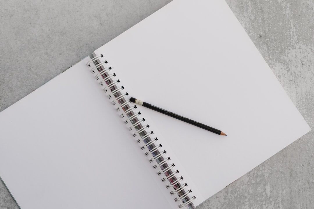 open notebook with pen